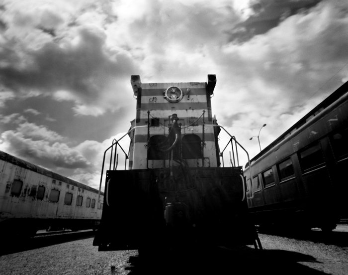 Taken with a Deardorff 4x5 View camera and a .3mm pinhole at the Arizona Railway Park in Chandler, Arizona." "This is the first of 12 photos taken by a 60 year old Deardorff once owned by Cole Weston. A .3mm pinhole was fitted to a standard lensboard and a simple hinged shutter installed on the front."
